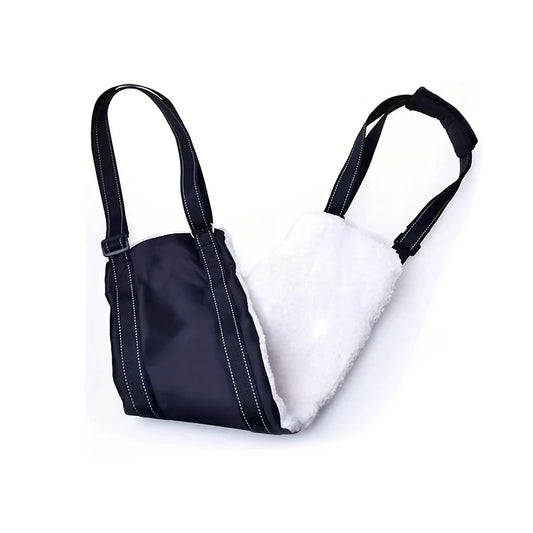 PawLift rear support sling laid flat, showing the black nylon body, white fleece lining and adjustable shoulder straps